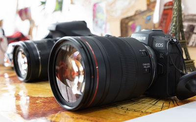 Close-up of camera on table