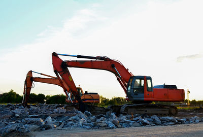 Construction site on field against sky