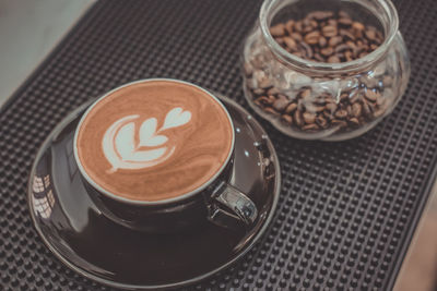 High angle view of cappuccino on table