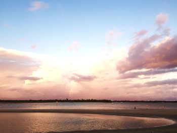 Scenic view of sea against cloudy sky