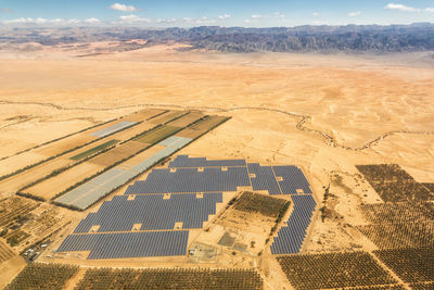 High angle view of agricultural field against sky