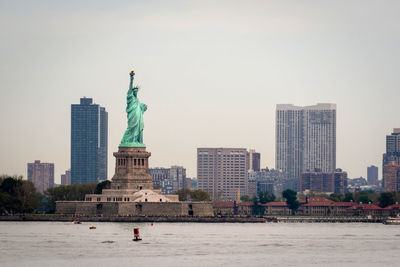 Statue of city at waterfront