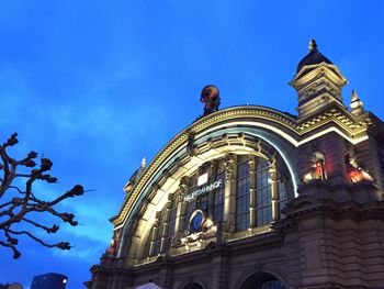 Low angle view of historical building against blue sky