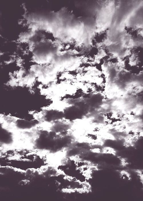 sky, low angle view, cloud - sky, beauty in nature, cloudy, tranquility, scenics, sky only, cloudscape, nature, tranquil scene, cloud, idyllic, backgrounds, weather, silhouette, outdoors, majestic, sunlight, no people