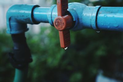 Close-up of water dripping from pipe