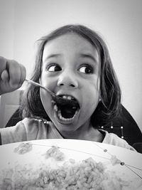 Portrait of young woman at home