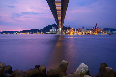 Illuminated city at waterfront