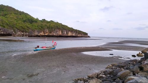 Scenic view of beach against sky