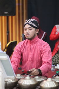 High angle view of boy playing with toy