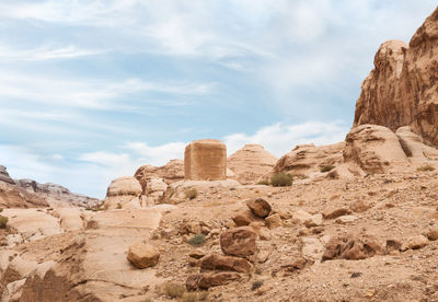 Rock formations on mountain against sky