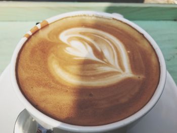 High angle view of cappuccino on table