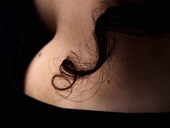 Close-up rear view of woman