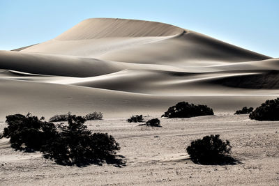 Scenic view of desert against sky