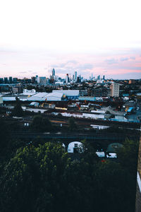 High angle view of buildings in city against sky