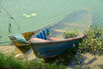 High angle view of boat moored on shore