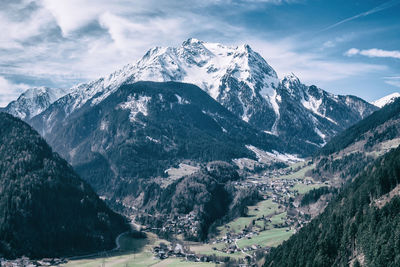 Low angle view of mountain range against sky