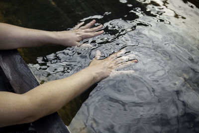 High angle view of people swimming in water