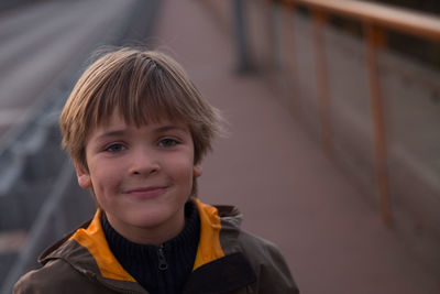 Portrait of smiling boy footbridge