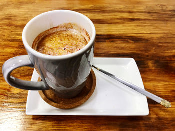 Close-up of coffee cup on table