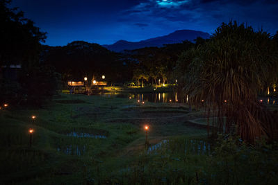 Scenic view of mountains against sky at night