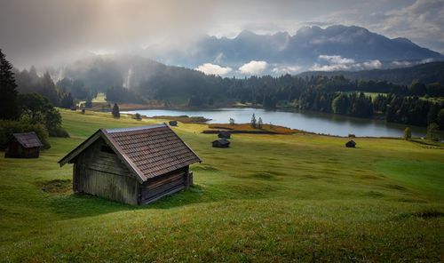 Scenic view of landscape and mountains against sky
