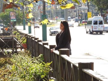 Woman standing in park