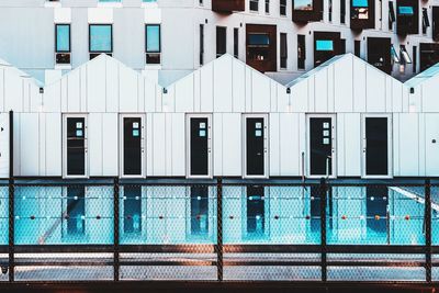 Full frame shot of swimming pool against building