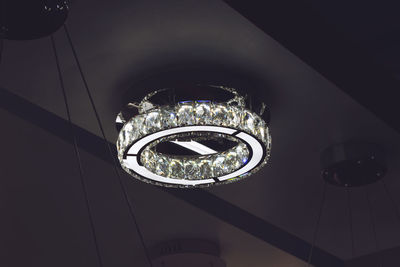 Low angle view of illuminated chandelier