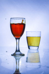 Close-up of beer glass on table