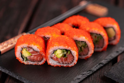 Close-up of sushi on cutting board