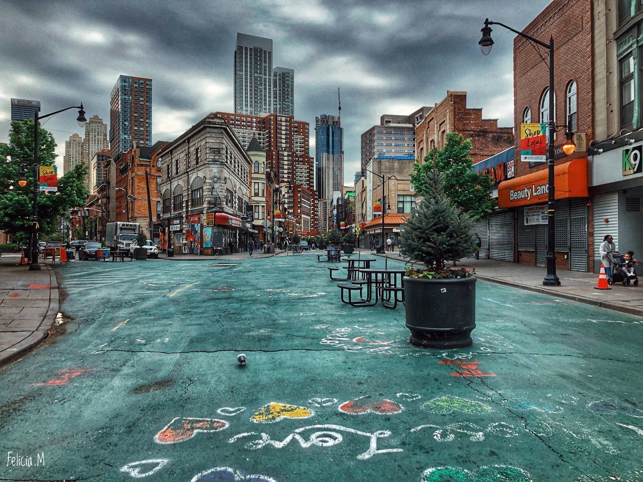 STREET AND BUILDINGS AGAINST SKY