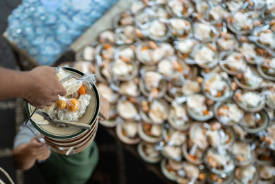 Midsection of woman holding food