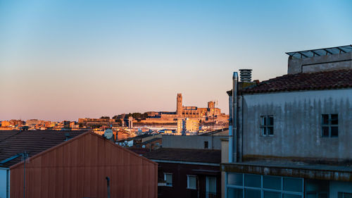 High angle view of buildings against sky during sunset