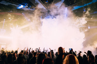 People enjoying at concert