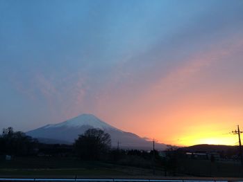 Scenic view of mountains at sunset