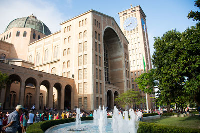 Group of people in front of building