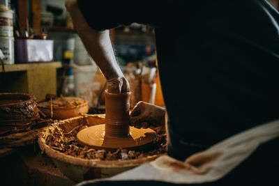 Man working with clay