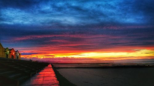 Scenic view of sea against sky at sunset