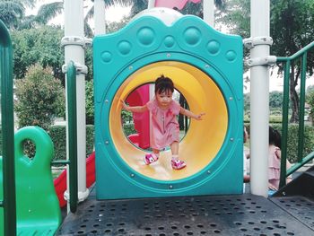 Low angle view of girl in playground