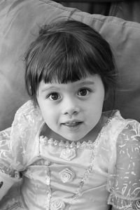 Close-up portrait of cute baby at home