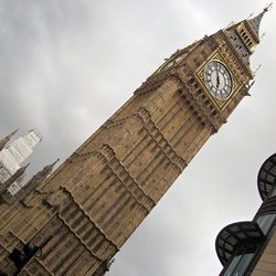 Low angle view of clock tower against sky