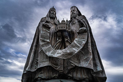 Low angle view of statue against sky