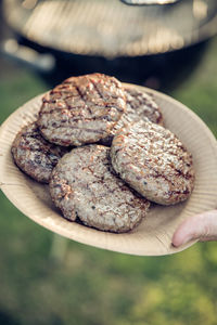 Close-up of hand holding bread