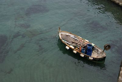 High angle view of fishing boat moored in sea