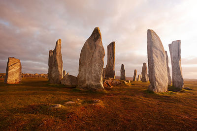 Panoramic view of rock formations against sky