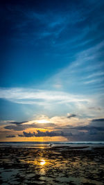 Scenic view of sea against sky at sunset