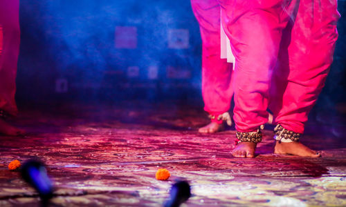 Low section of women dancing on stage