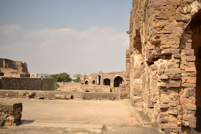 Golconda fort area ruined structure walls in india background stock photograph
