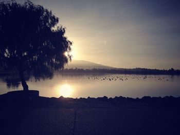 Scenic view of sunset over river