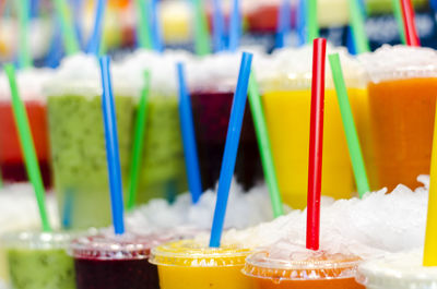 Close-up of various slush for sale at market